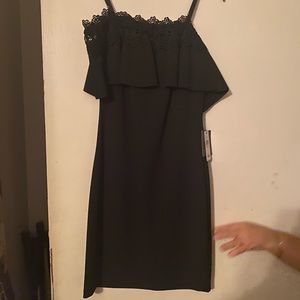 A nice elegant black formal dress , straps are for hangers (off the shoulder)